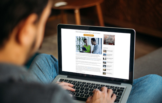 Man Using Laptop Blank Screen at Home