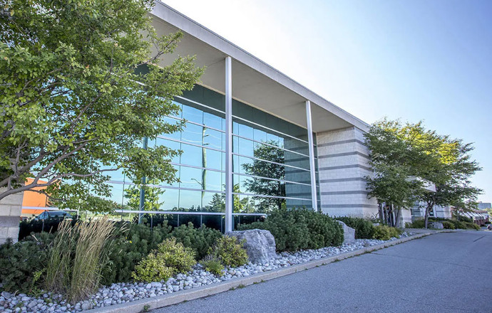 Exterior of an industrial building at 549 Conestoga Boulevard in Cambridge, Ontario.