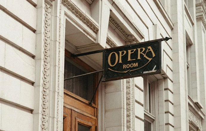 A sign that read OPERA Room