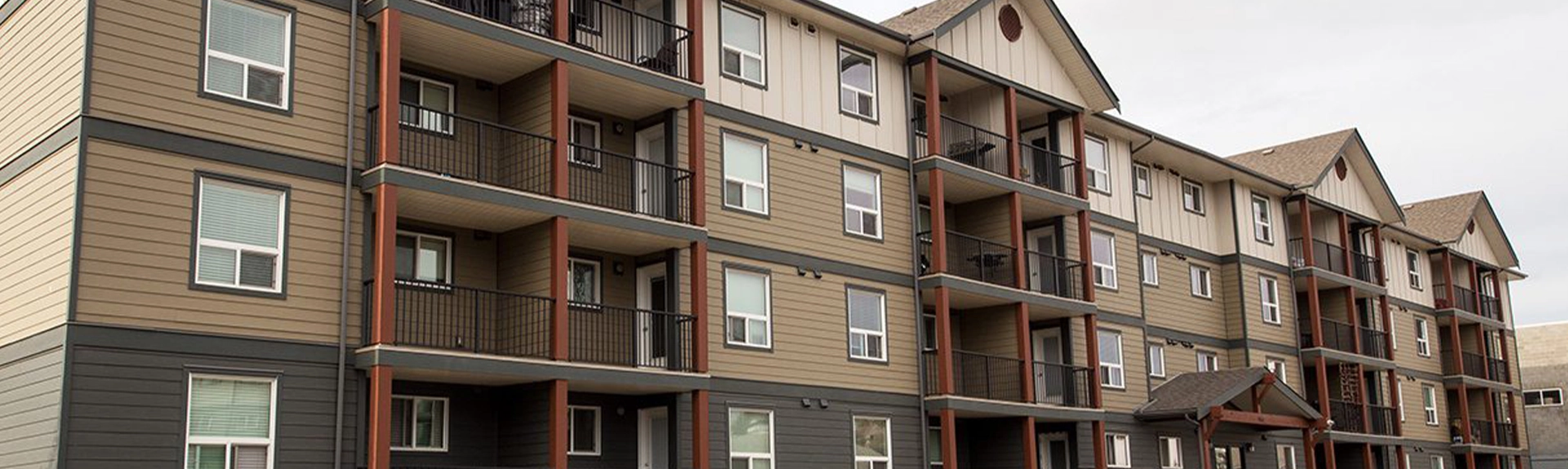 Exterior of an apartment building at 900, 901 & 904 100A Avenue in Dawson Creek, British Columbia